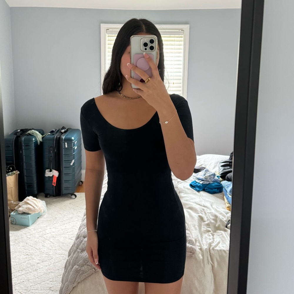 Black low back body con dress
